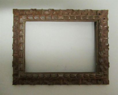 Cadre en noyer naturel monoxyle sculpté ciré...