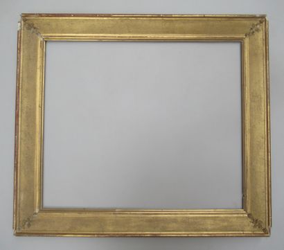 Cadre en bois et pâte doré dit 