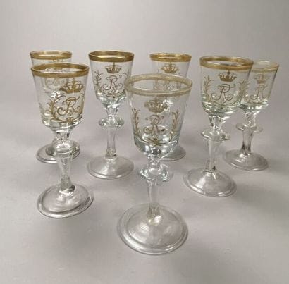 Suite of 7 crystal glasses with gold monogrammed...