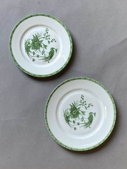 White porcelain dinner service with green...