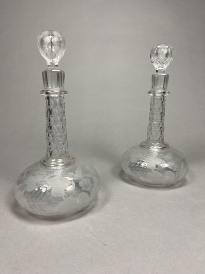 Pair of engraved crystal decanters with vegetal...