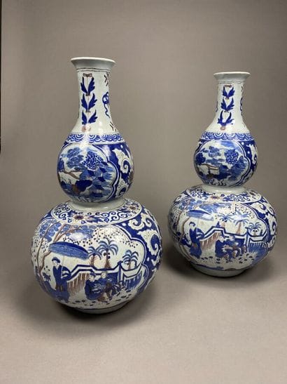 Pair of blue enameled earthenware gourd pots....