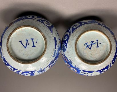 Pair of blue enameled earthenware gourd pots....