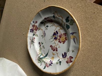 Part of an earthenware dinner service decorated...