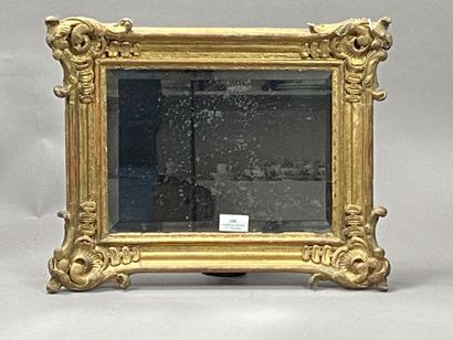 Gilded wooden frame transformed into a mirror....