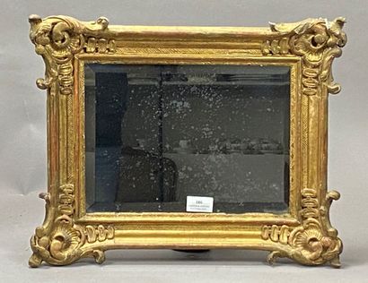Gilded wooden frame transformed into a mirror....