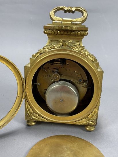 Officer's clock in gilt bronze, movement...