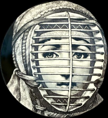 Piero FORNASETTI (1913-1988)
Assiette en...