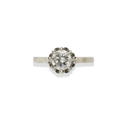 Bague diamant

Sertie d'un diamant rond taille...