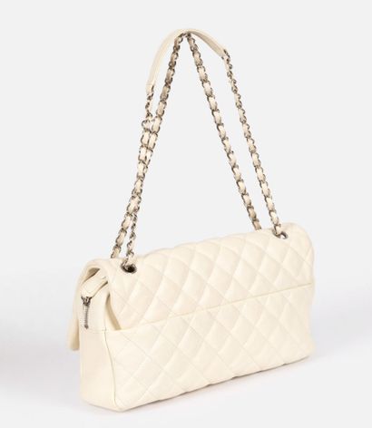 CHANEL
Flap bag in ivory quilted caviar grain...
