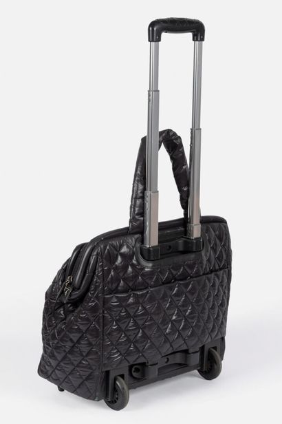 CHANEL
Cocoon tote bag in black quilted nylon,...
