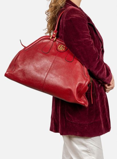 GUCCI
Handbag in red distressed calfskin
Beige...