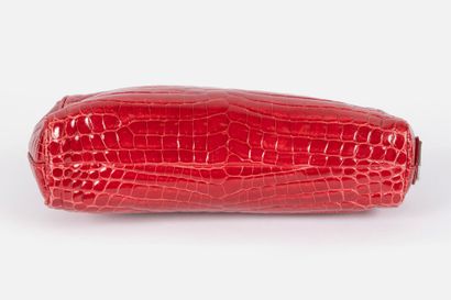 PRADA 
Bowling clutch bag in raspberry-red...