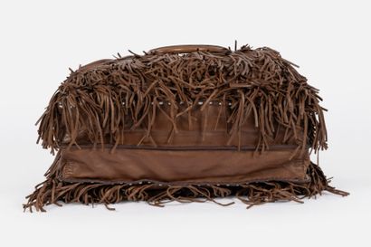 PRADA
Shopping bag in hazelnut fringed lambskin
Beige...