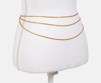 CHANEL BY KARL LAGERFELD
Three-row gold metal...