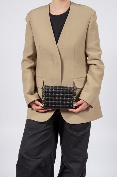 CHANEL
Clutch bag in black lambskin embellished...