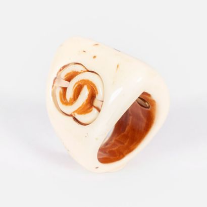 CHANEL
Varnished ivory-cream resin triangular...