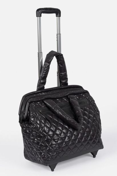 CHANEL
Cocoon tote bag in black quilted nylon,...