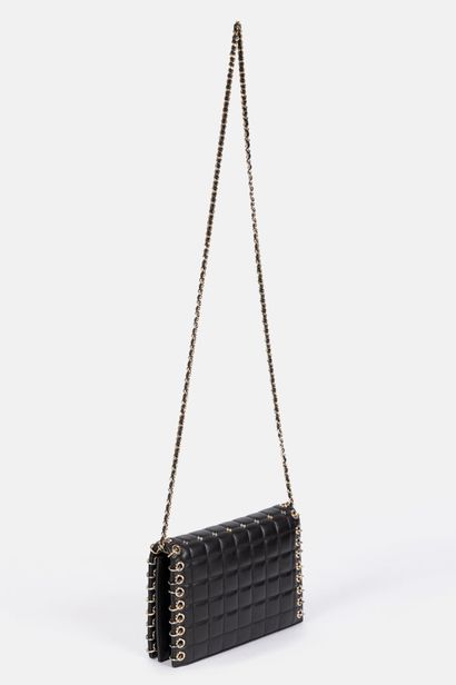 CHANEL
Clutch bag in black lambskin embellished...