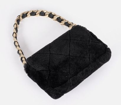 CHANEL
Black quilted sheepskin 20cm flap...