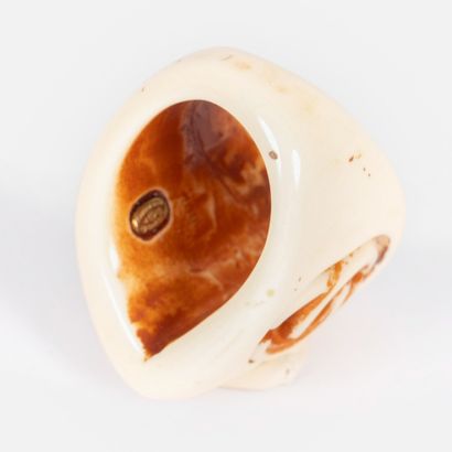 CHANEL
Varnished ivory-cream resin triangular...