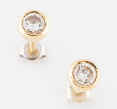 Boucles d'oreilles diamants
En or 18K (750),...