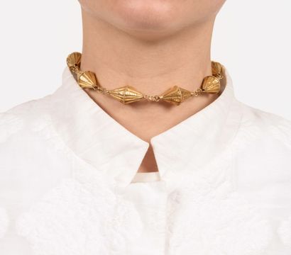 Bracelet en or 18K (750),
Composé d'une succession...