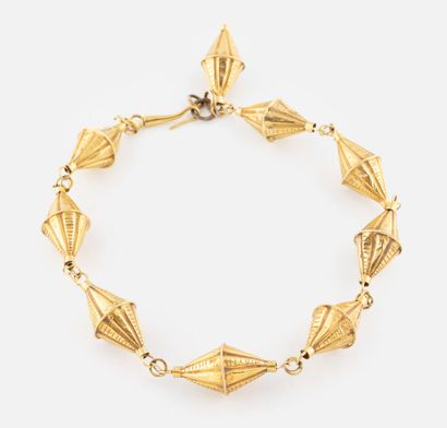 Bracelet en or 18K (750),
Composé d'une succession...