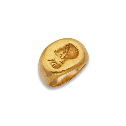 Bague en or 
En or 18K (750), ornée d'un...