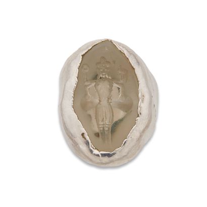 TRAVAIL CONTEMPORAIN
Bague métal et verre
En...
