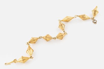 Bracelet en or 18K (750),
Composé d'une succession...