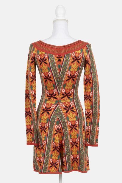 ALAIA
Off-the-shoulder, form-fitting mini...