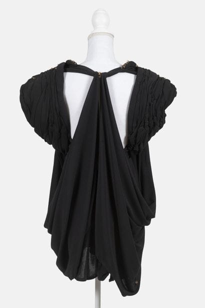 REINHARD LUTHIER
Black chiffon mini dress...