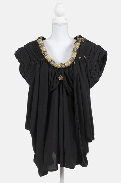 REINHARD LUTHIER
Black chiffon mini dress...