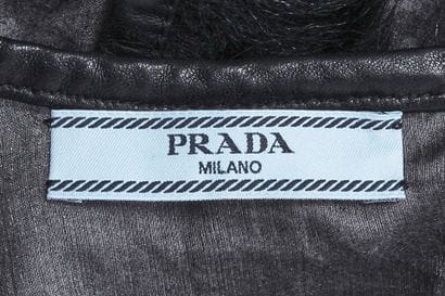 PRADA
Gray organza and fur dress,
Embellished...