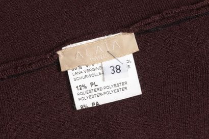 ALAIA
Burgundy sleeveless midi dress in wool...