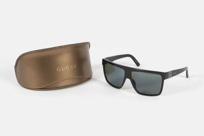GUCCI
Pair of black sunglasses,
Black lenses,...