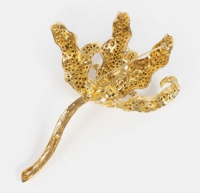 KENNETH JAY LANE
Gold-tone metal flower brooch...