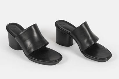 MAISON MARTIN MARGIELA
Pair of black leather...
