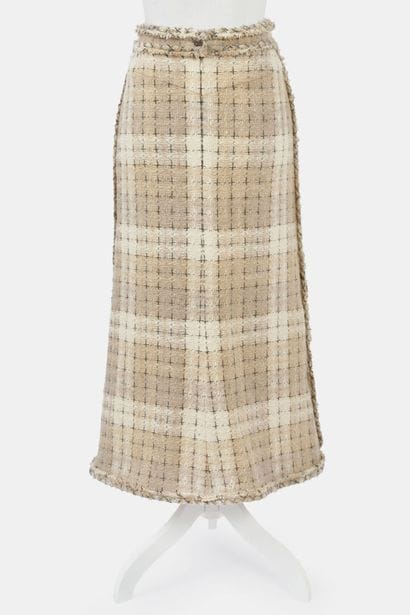 CHANEL
Long skirt in beige wool tweed with...