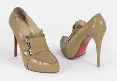 LOUBOUTIN
Pair of khaki patent leather heels,...