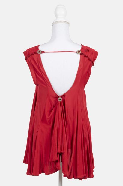 REINHARD LUTHIER
Red backless mermaid-style...