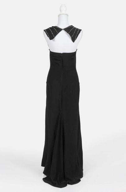 REINHARD LUTHIER
Long, flared dress in black...