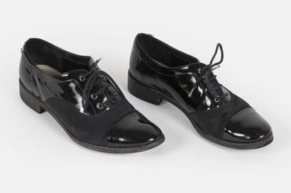 CHANEL
Pair of black patent leather and black...