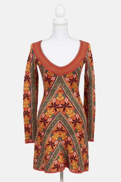 ALAIA
Off-the-shoulder, form-fitting mini...