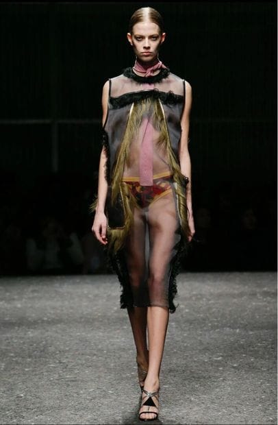 PRADA
Gray organza and fur dress,
Embellished...