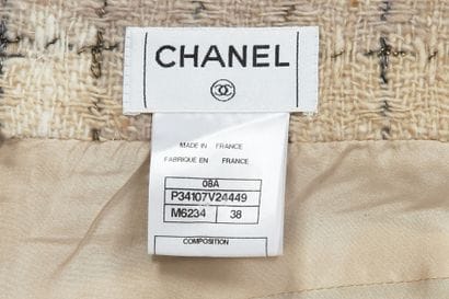 CHANEL
Long skirt in beige wool tweed with...