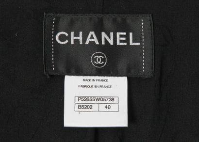CHANEL
Jacket with shoulder pads, made of...
