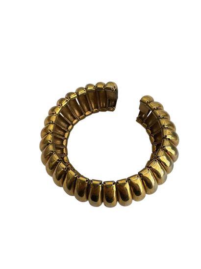 GILDED METAL CUFF BRACELET 
Gilded metal...