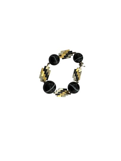 GOLD AND SARDONYX BRACELET
18k (750 thousandths)...